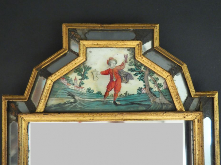 Miroir à parecloses XIXème orné d'un fixé sous verre représentant un b