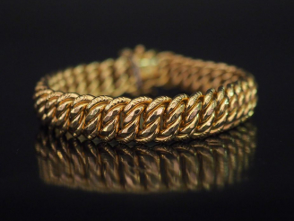 Vente aux enchères Bracelet souple en or jaune, maille américaine. Long. 18,7 cm Poids. 2
