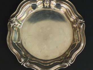 Vente aux enchères 	Dessous de bouteille en argent, poinçon Minerve, modèle à filet agrém