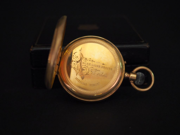 Montre de gousset en or jaune.  Cadran à chiffres romains pour les heu