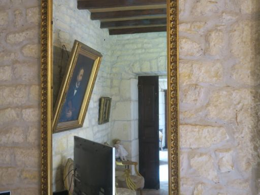 Miroir de style Louis XVI en bois et stuc doré, à décor de frise de fl