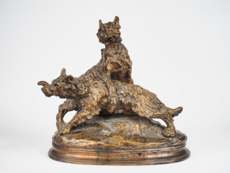 Vente aux enchères Thomas CARTIER. 'Chiots jouant'. Groupe en bronze à patine médaille. S