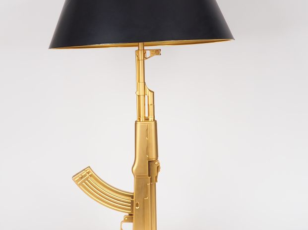 Philippe STARK pour Flos.  Lampe "Happiness is a hot gun" Etiquette de