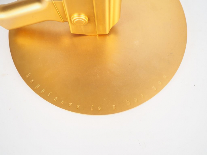 Philippe STARK pour Flos.  Lampe "Happiness is a hot gun" Etiquette de