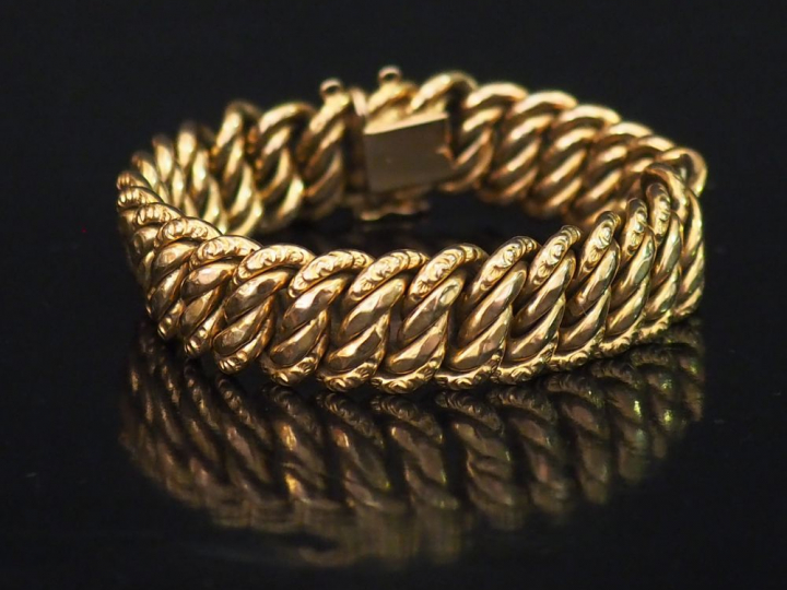 Bracelet articulé en or jaune, maille américaine.  Long. 19 cm Poids. 