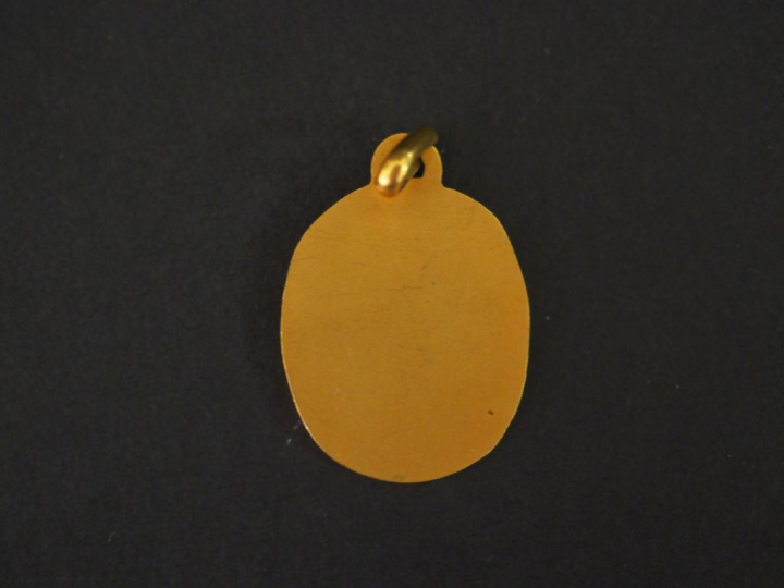 Médaille religieuse de style Art déco en or jaune, figurant Saint Jean