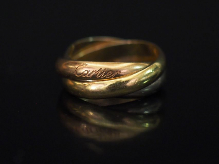 CARTIER, Trinity  Bague trois anneaux en or de trois couleurs.  Signée