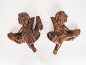 Vente aux enchères Paire de sujets XIXème en bois sculpté, "angelots". Dim. 32 x 31 x 15 