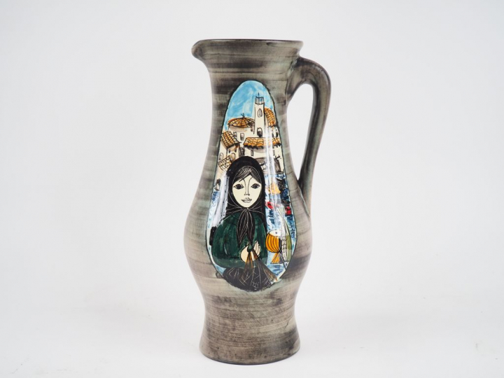 Jean de LESPINASSE.  Cruche en céramique émaillée à décor dans une rés
