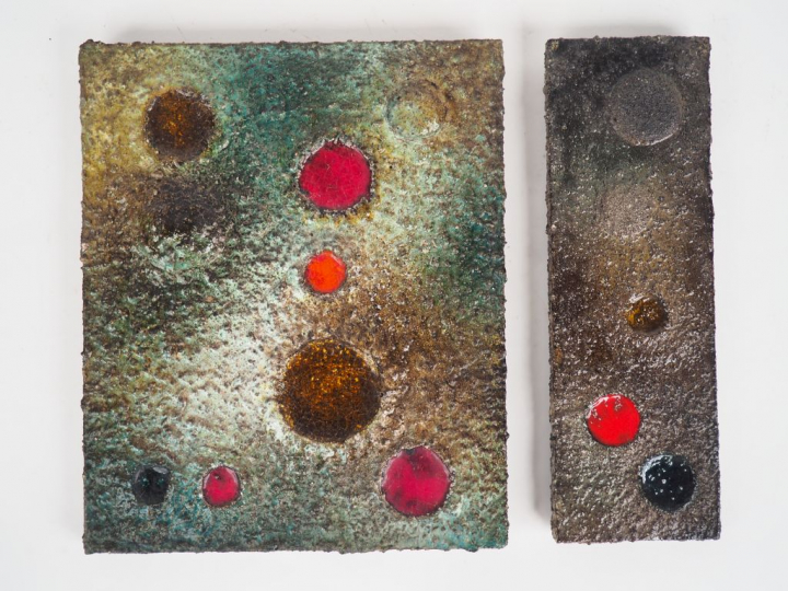 M. DUCOS. Deux différentes plaques en terre cuite émaillée polychrome,