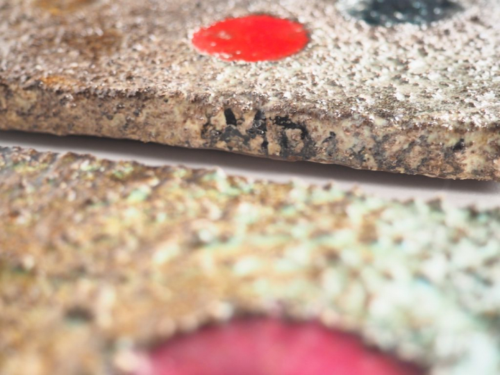 M. DUCOS. Deux différentes plaques en terre cuite émaillée polychrome,