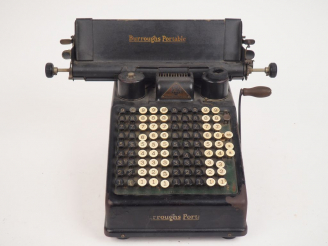 Vente aux enchères GLOGOWSKY   Co. Burroughs portable, machine à écrire.