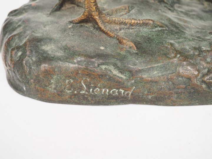 Emile LIENARD. "Couple de perdrix". Groupe en bronze double patine. Si