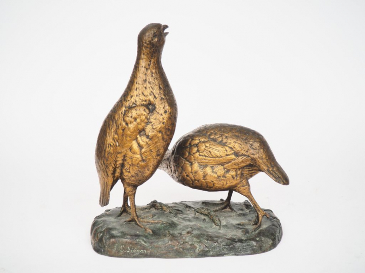 Emile LIENARD. "Couple de perdrix". Groupe en bronze double patine. Si