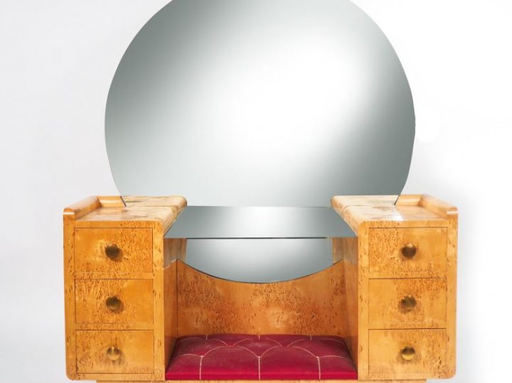 Coiffeuse Art Déco en loupe de bois clair,  ouvrant à 6 tiroirs et orn