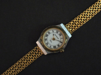 Vente aux enchères Bracelet de montre de dame en or.  Poids tel : 20,50 g   