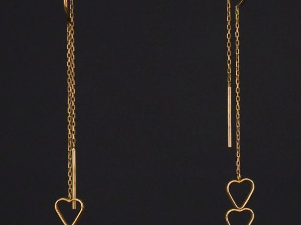 Paire de pendants d'oreilles en or, à décor de cœurs superposés. Poids