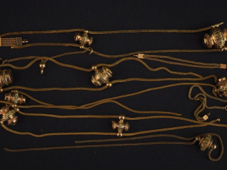 Vente aux enchères Eléments de giletières Napoléon III en or.  Poids : 26,42 g   