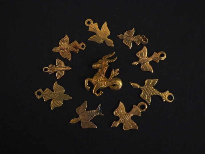 Ensemble de St-Esprit ou animaux en or.  Poids : 4,86 g   