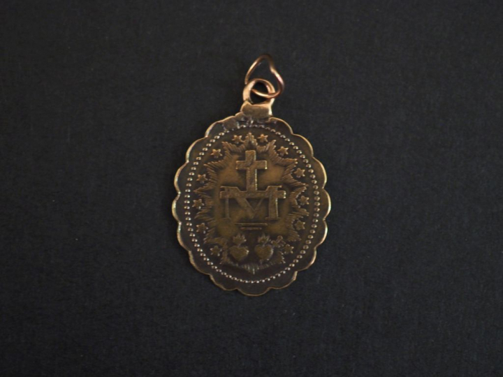 Médaille "de la rue du Bac" en or.  Poids : 0,81 g   