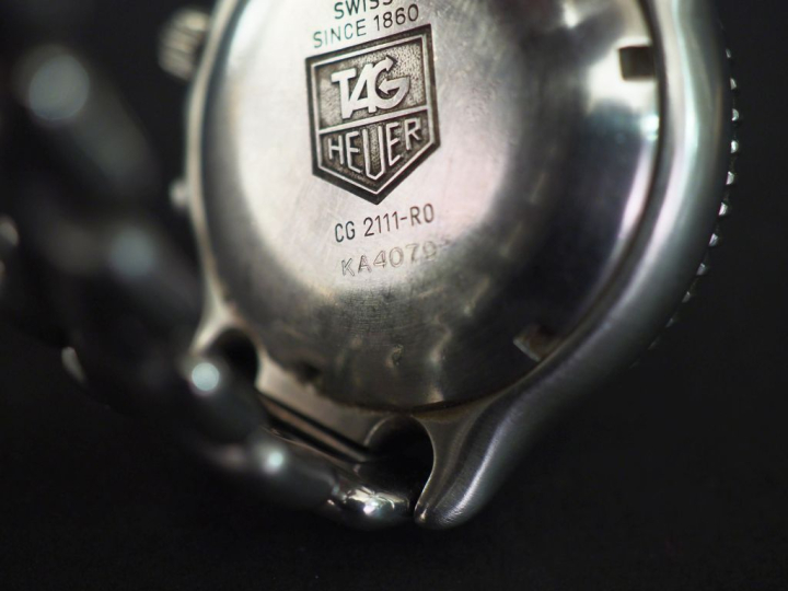 TAG HEUER, Automatic Montre bracelet d'homme en acier.  Boitier à lune
