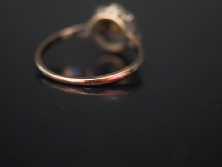 Bague marguerite Napoléon III, diamant central de taille ancienne, ent