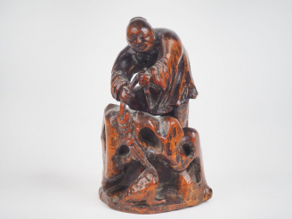 Vente aux enchères Chine, XXe siècle,  Sujet en bois sculpté représentant liuhai accompag