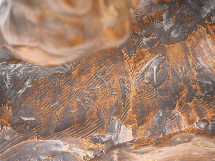 Thomas CARTIER. "Lionne rugissant". Sculpture en stuc à patine brune. 