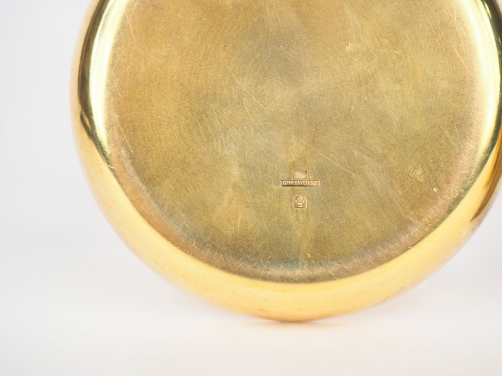 CHRISTOFLE. Petit nécessaire 3 pièces en métal doré à décor d'étoiles.