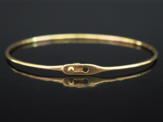 Vente aux enchères DINH VAN  Bracelet jonc en or jaune.  Signé. 6,2 x 5,3 cm Poids. 8,18 