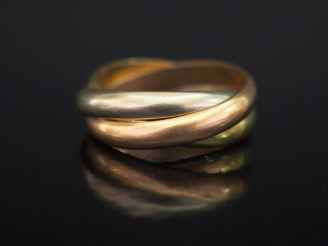 Vente aux enchères Alliances triples joncs trois tons d'or.  TDD. 59 Poids. 12,62 g (à ch