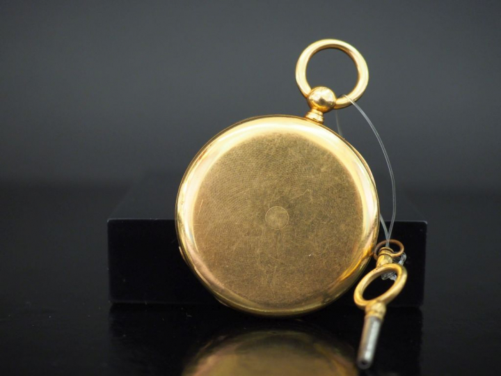 Montre de gousset en or jaune.  Cadran à chiffres romains pour les heu