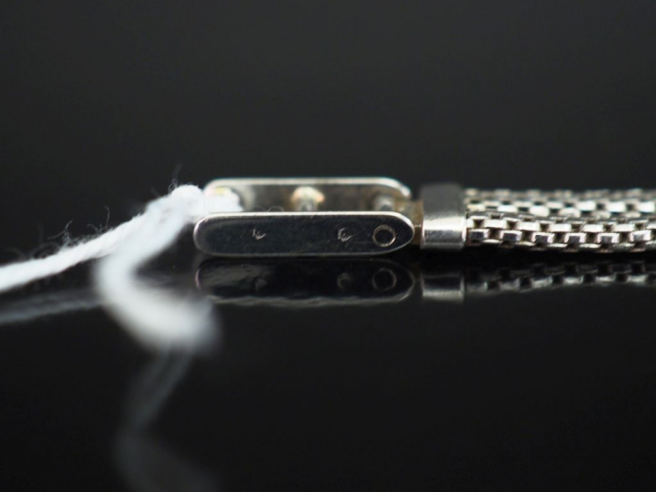 GERMOR Montre bracelet de dame, boitier et bracelet en or blanc.  Cadr