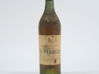 Vente aux enchères 1 VIEILLE EAU DE VIE ST MARTIN - CAPS ÉTAIN