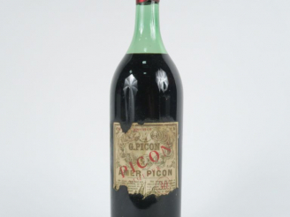 Vente aux enchères 1 TRÈS VIEILLE BOUTEILLE AMER PICON - CAPS ETAIN/ED