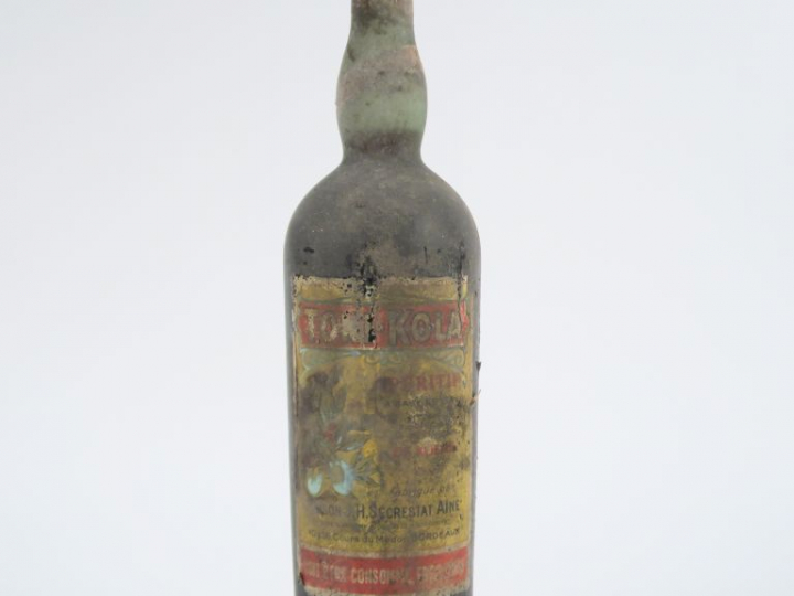 1 VIEILLE BOUTEILLE (1 L) TONI KOLA SECRESTAT - BS/EA - CAPS ÉTAIN