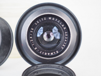 Vente aux enchères LEITZ Elmarit-R F=35/1:2.8 n°2034157. Objectif avec parasoleil.  (état
