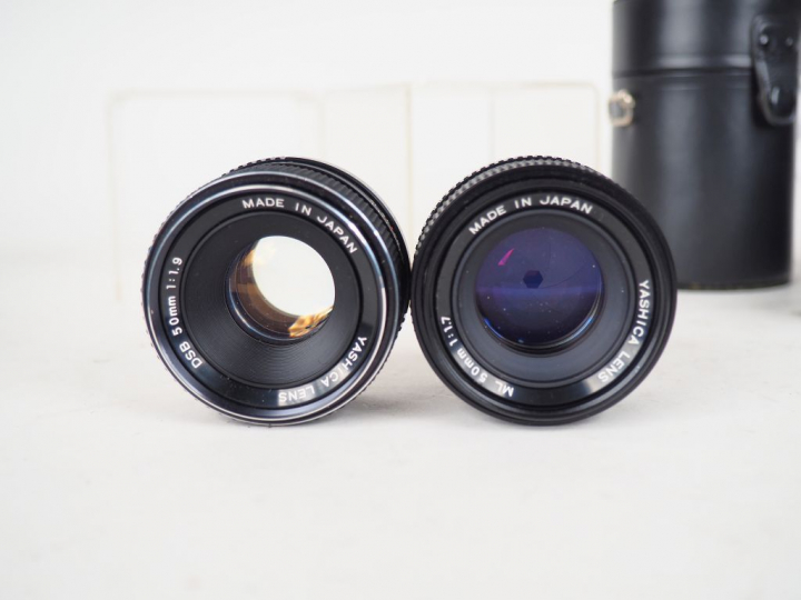 Lot de neuf différents objectifs dans leur boite ou housse : MINOLTA, 