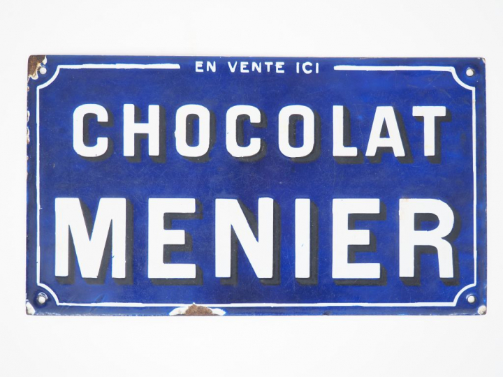 Plaque émaillée "Chocolat Meunier". Dim. 20 x 35,5 cm (petits éclats)
