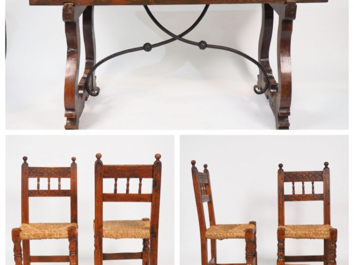 Table espagnole en noyer, piétement relié par une entretoise en fer fo