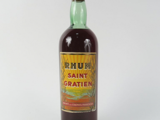 Vente aux enchères 1 VIEILLE BOUTEILLE RHUM SAINT GRATIEN