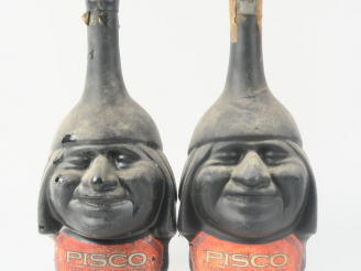 Vente aux enchères 2 VIEILLES BOUTEILLES PISCO LICOR DE LOS INCAS 33°