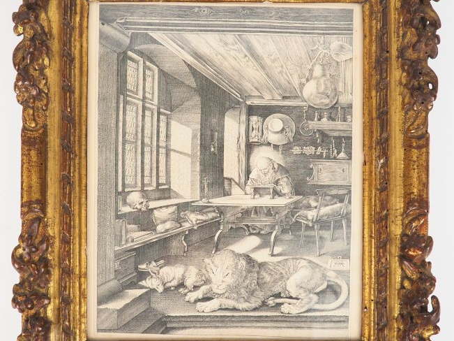 D'après DURER.  Gravure en noir dans un cadre XVIIIème en bois sculpté