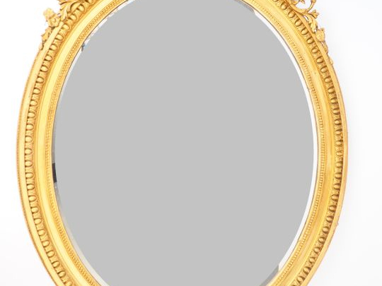 Grande glace médaillon Napoléon III de style Louis XVI à décor de godr