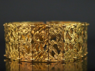 Vente aux enchères Bracelet articulé en or jaune 750, composé de maillons rectangulaires 