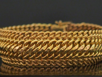 Vente aux enchères Bracelet souple en or jaune 750, maille plate légèrement bombée et tre