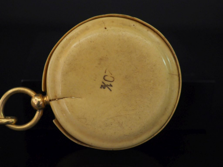 Montre de gousset et sa giletière Napoléon III en or jaune.  Cadran à 