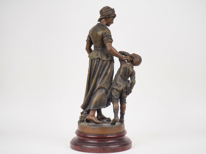 S. GREGOIRE. "réprimande". Grand sujet en régule polychrome sur un soc