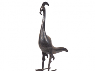 Vente aux enchères Grand sujet persan en métal doré "oiseau échassier".  H. 63 cm