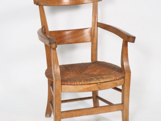 Vente aux enchères Fauteuil paillé de style Directoire en merisier.